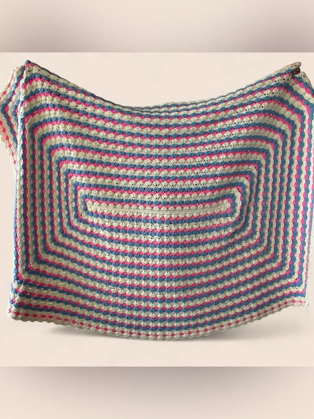 Oversized vintage handmade crochet afghan blanket in pink, blue and cream